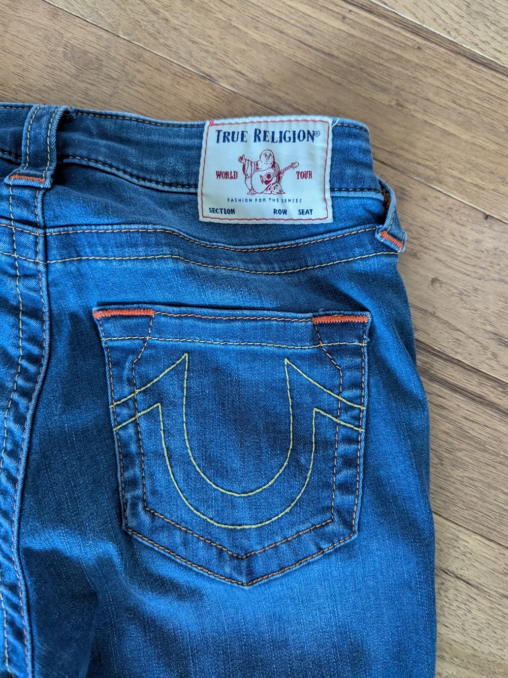 True Religion Blue Skinny Jeans with Yellow & Orange Stitch Detail